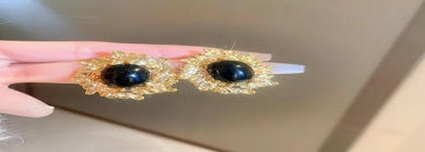 Black Eye Gold Fringe Earrings