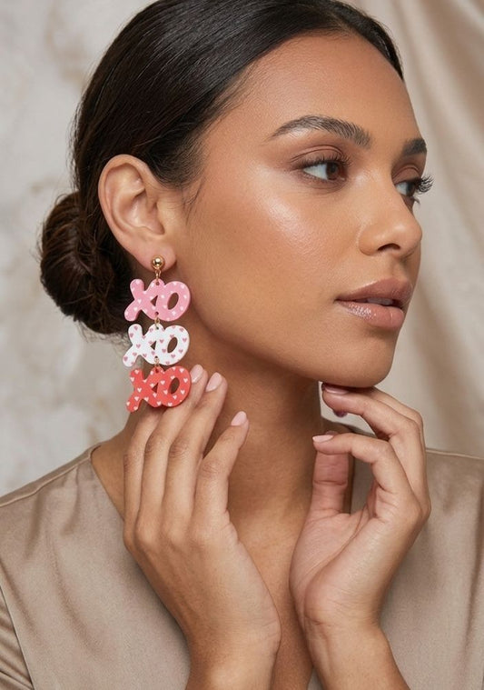 Triple tiered XOXO heart pattern statement earrings